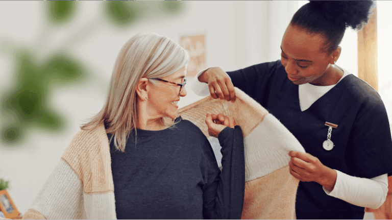 Nurse helping patient